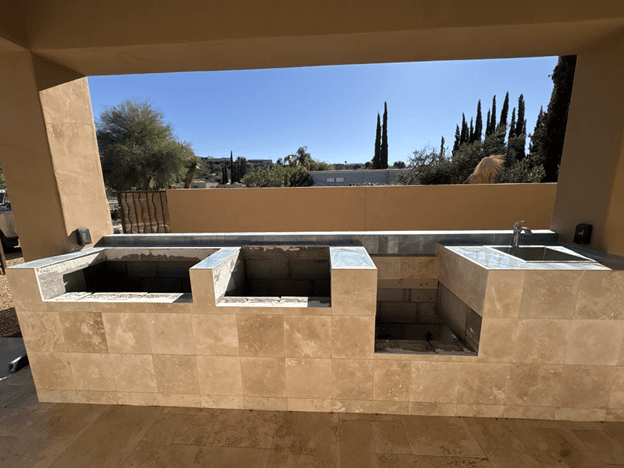Travertine outdoor kitchen under construction